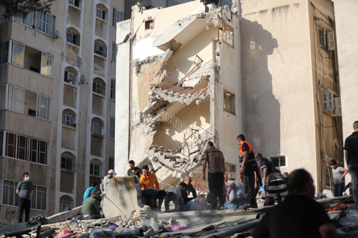 Gaza israel rubble destroyed volunteers palestinian strikes rimal conflict israeli compound hanadi