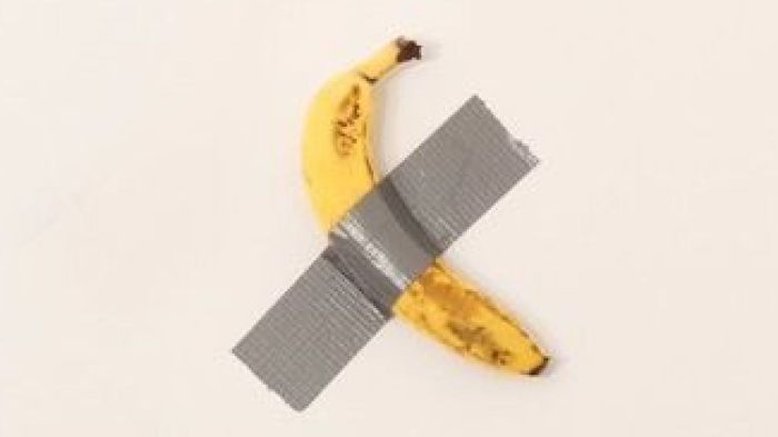 Cattelan duct taped maurizio sells dagospia installations selling crypto choosing carefully considered