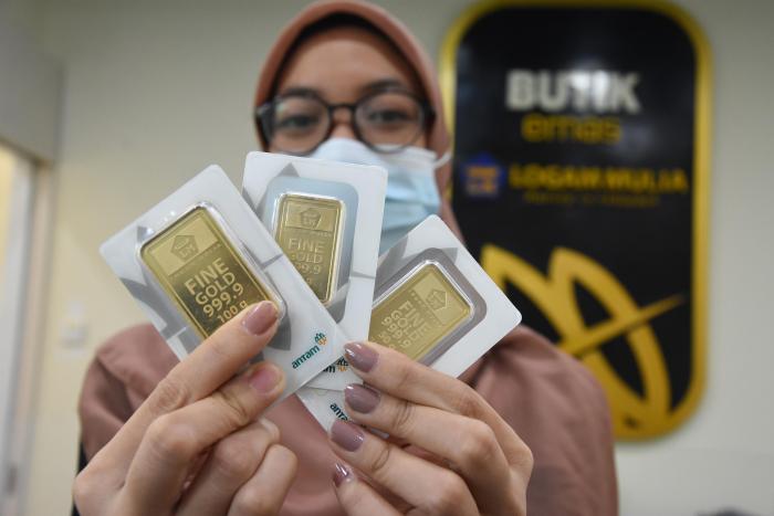 Dampak penurunan harga emas antam terhadap investasi