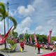 Foto suasana Kejurprov IMI Aceh Honda Cup Race Putaran 4 di Sirkuit Non Permanen Aceh Ramoang, Aceh Tamiang, menampilkan pembalap sedang beraksi dengan penonton memenuhi area sirkuit.