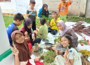 KPM Mandiri UIN Sultanah Nahrasiyah Ajak Anak-anak Rawat Alam Melalui Gerakan Menanam Bunga